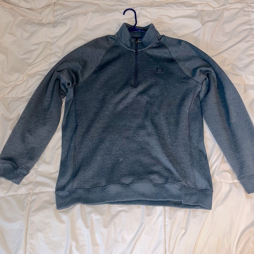 Men’s Under Armour quarter zip, long sleeve performance fabric shirt.